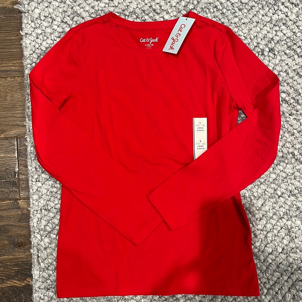 New with tag long sleeve t-shirt size 10-12